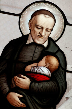 A stained glass of Saint Vincent de Paul. Vitrail de Saint Vincent de Paul.