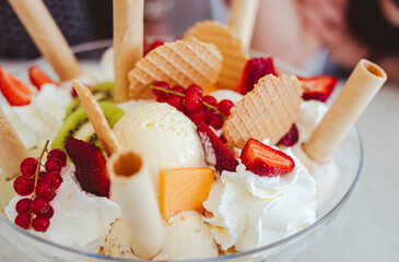 Huge Ice Cream Cup with fresh fruit toppings.