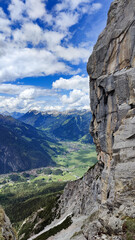 Alps lake reflecting snow covered Zugspitze mountain in spring 