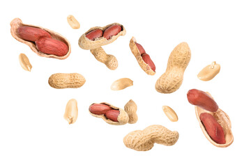 Unpeeled peanuts in air on white background