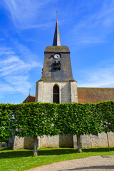 Church of Saint Germain in Nargis, a village of the French department of Loiret, Centre Val de Loire, France - Built in the 15th century it has a bell tower in a Dauphinois style