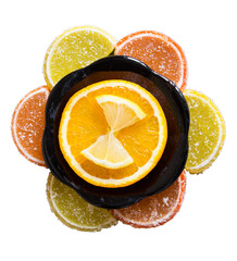 Colorful marmalade lemon and orange pieces with sugar and sliced fresh lemon and orange