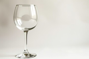 Elegant wine glass on a white background, perfect for dining elegance
