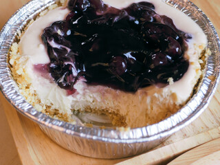 Blueberry Cheese Pie on a wooden tray, delicious dessert  