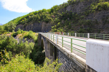 Bridge of Barjavel above the lake of Serre-Ponçon in the French Alps, a dammed artificial...