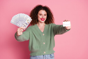 Photo of adorable lovely nice woman wear stylish khaki clothes showing cash isolated on pink color background