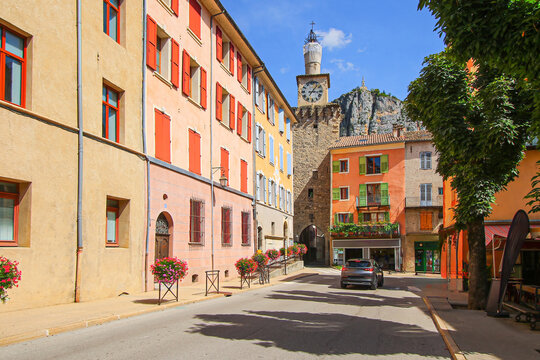 Fototapeta Clock tower of the Provencal village of Castellane in the southern Alps in the French department of Var - This is a popular tourist destination as it is start of any visit to the Verdon Gorges