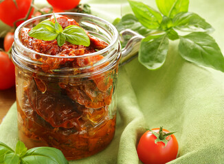 traditional Italian sun-dried tomatoes in oil with basil