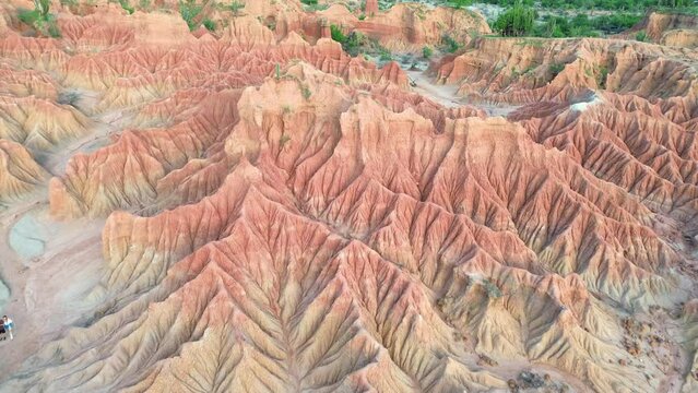 Tatacoa desert red part. Incredible drone aerial view of a rock with so beautiful colour and two birds. Villavieja, Huila Colombia