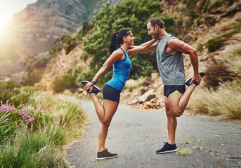 Couple, stretching and together on mountain for fitness, warmup and commitment to wellness. Man,...