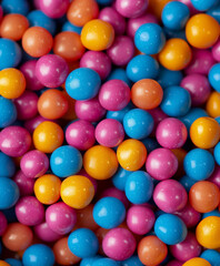 Colored background with round candies