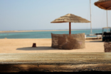 Desk of free space and summer ladnscape of beach and sea. 