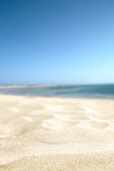 Summer background of sand and landscape of sea. 