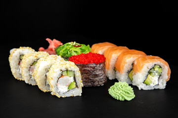 mini set of Philadelphia rolls and gunkan (wakame and flying fish roe)