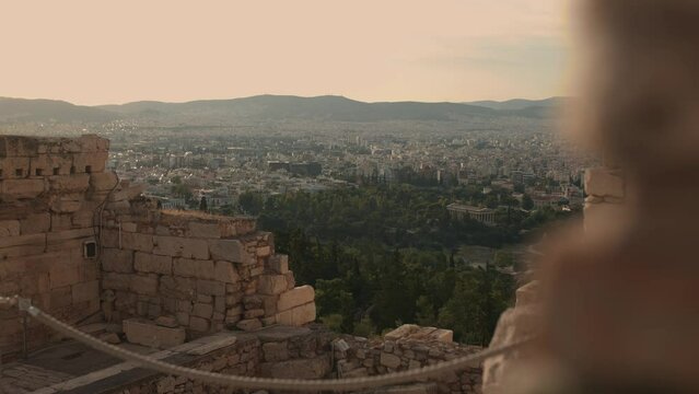 Ancient Greek ruins with a beautiful sunset view of the city