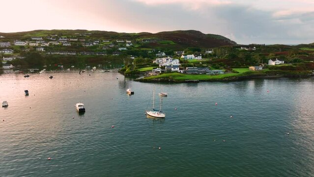 Beautiful yachts against the backdrop of a seaside town