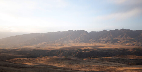 Autumn landscape of vast plains in China. Breathtaking, amazing, endless desert mountain landscapes...