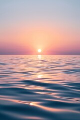 Fototapeta premium As the sun sets over the water, nature's beauty unfolds in a colorful canvas of orange, red, and gold.