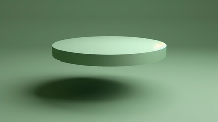 Captivating simplicity: a floating circle set on a serene green solid colored texture.