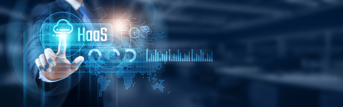 Businessman touching hardware as a service (HaaS) solutions network connection, data management and cloud computing infrastructure and services concept. Modern business transformation.
