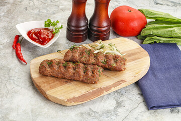 Kebab with beef served onion
