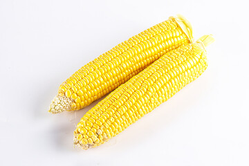 Sweet yellow raw corn cob