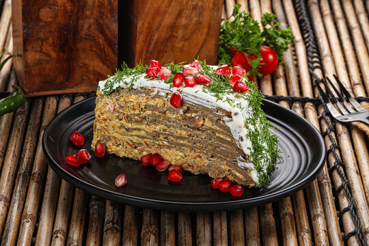 Homemade chicken liver cake served granet
