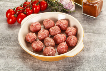 Uncooked raw beef meatball minced