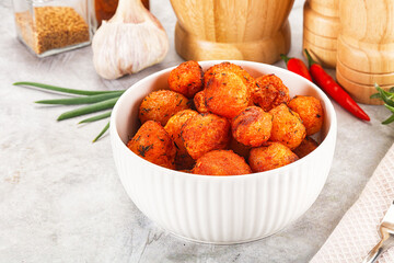 Baked young potato with paprika