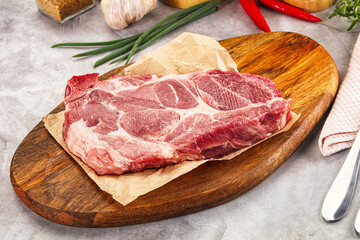 Raw pork neck steak for grill