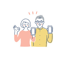 笑顔でスマホ画面を見せるカップル