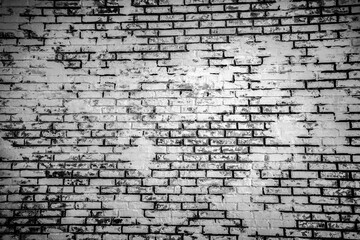 Vintage Black and White Brick Wall Texture with Weathered and Distressed Surface for Backgrounds, Design Projects, and Artistic Creations