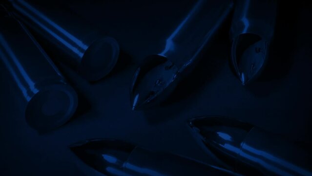 Police Lights Flash On Bullets Closeup
