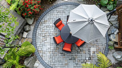 Circular Paver Patio, pavers arranged in a circular pattern, round dining table with an umbrella and matching chairs