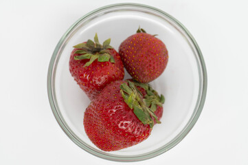Strawberries in Glass Bowl with White Background