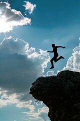 A person takes the leap of faith from a cliff, soaring through the air