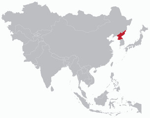 Highlighted red map of NORTH KOREA inside grey detailed blank political map of Asia on light blue background, without the Middle East and Russia