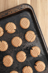Overhead shot of ready to bake peanut butter cookies on baking sheet