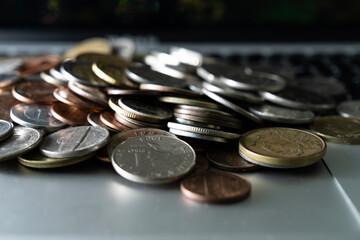 View of the various coins on the laptop