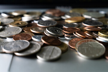 View of the various coins on the laptop
