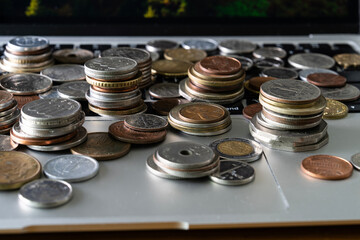 View of the various coins on the laptop