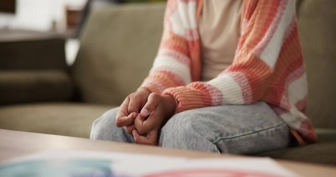 Girl, hands and anxiety on therapy couch, fidget and worry for mistake of fail confession at clinic. Female person, fingers and mental health burnout or psychology, patient and counseling for trauma