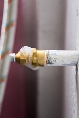 Gas leak at home boiler room. Inflating bubbles of soap mixture