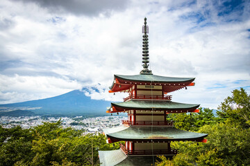 chureito pagoda with mount fuji in background, covered in clouds, observation deck, fujisan,...