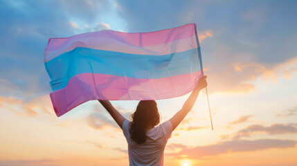 Transgender woman in colorful outfit rainbow background. Pride self expression LGBT, LGBTQ concept