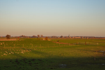 Rural Landscape with Distant Village at Dusk
