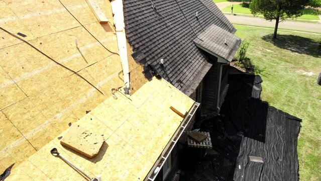 House with new roof being installed