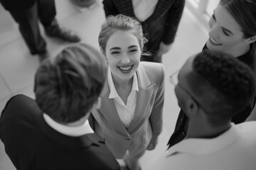 A group of people standing together, possibly waiting or discussing something