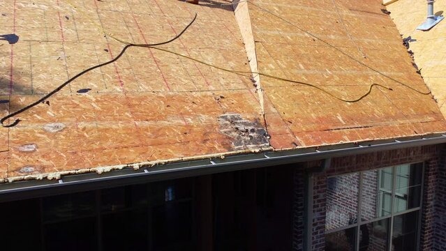 Roof decking with rotten wood under the shingles
