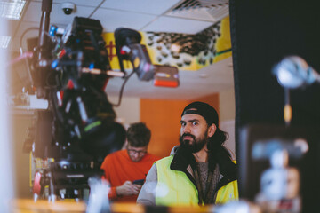 Director of photography with a camera in his hands on the set.